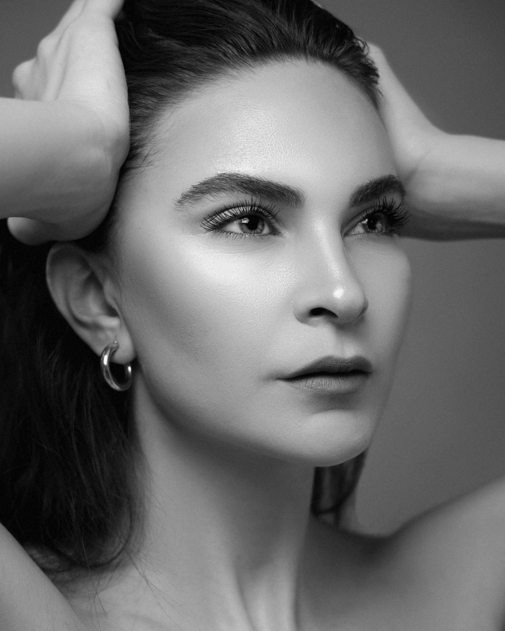 Three-quarter portrait — upper-third facial treatments